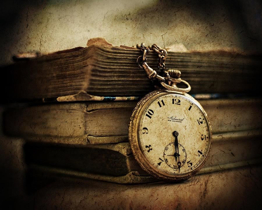 Clock with stack of books